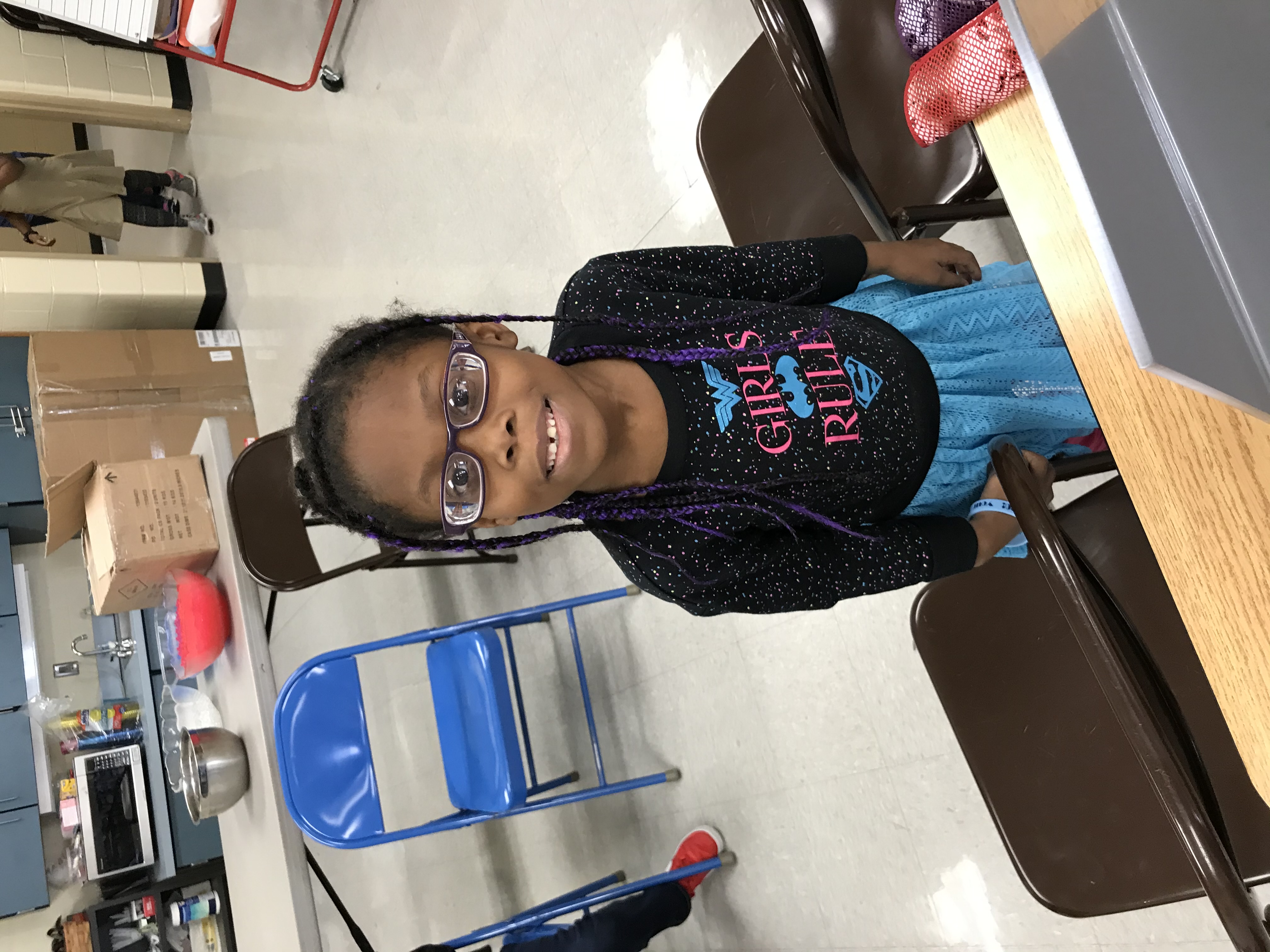 Child wearing new glasses
